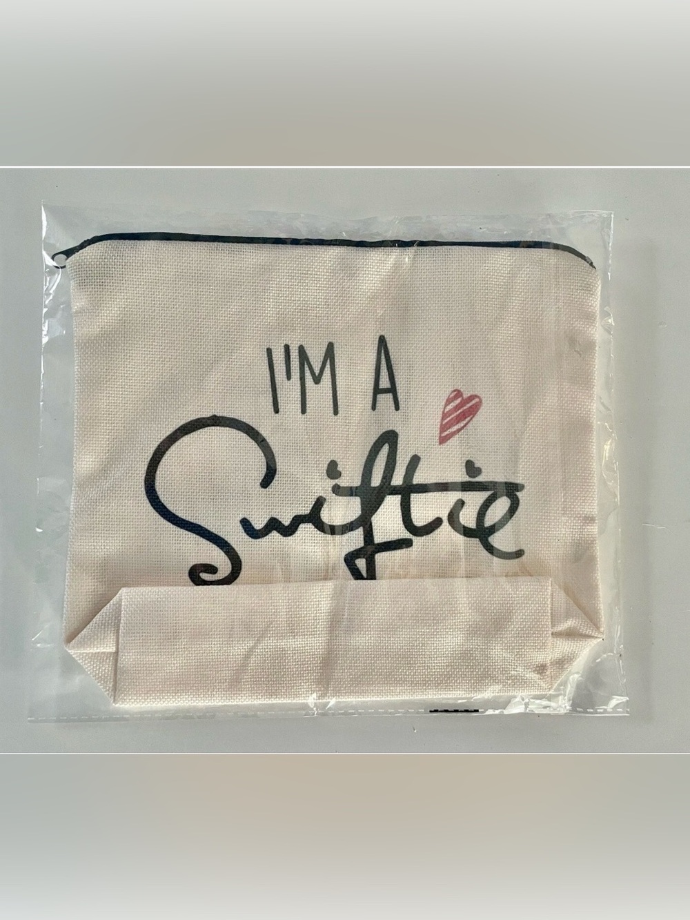 I'm A Swiftie Cosmetic Pouch - Cream with Black and Rex